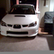Illustration for article titled Subaru Fan-Boys Drive Impreza Into Living Room To Watch TV Up-Close